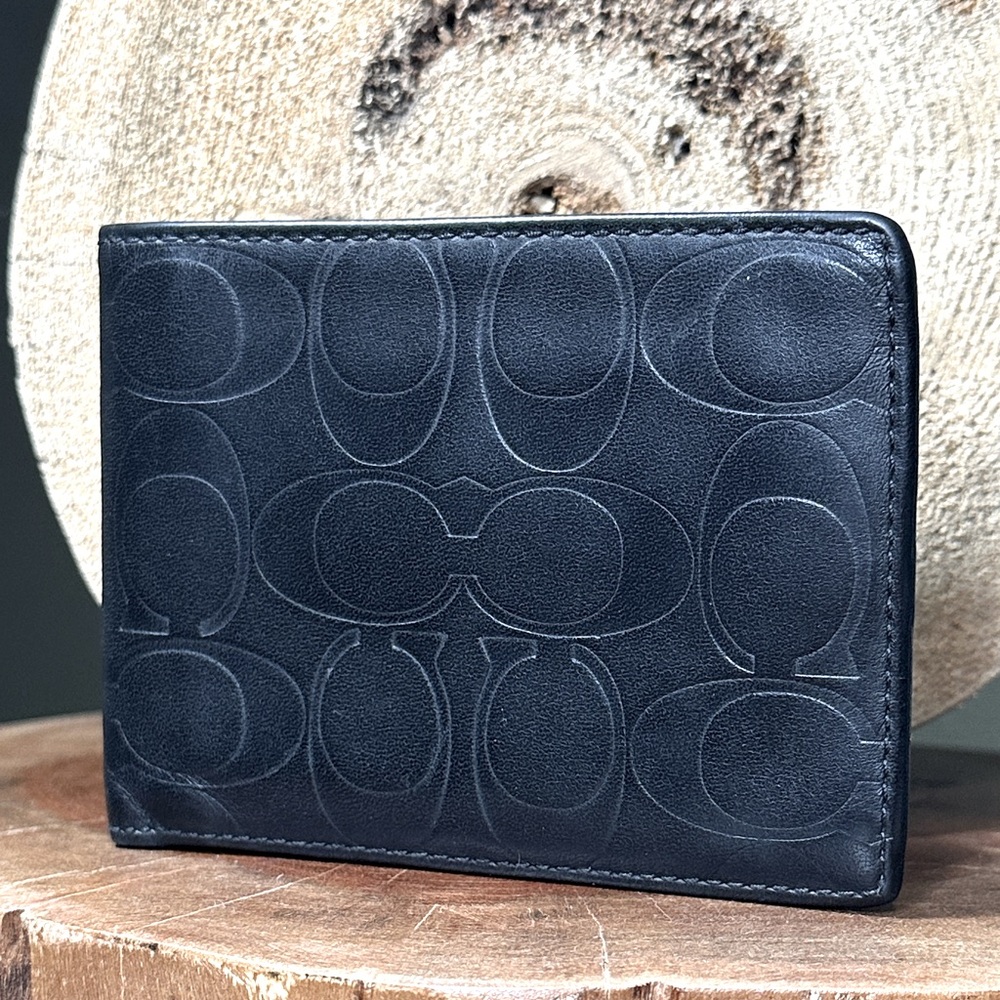 COACH Signature Embossed Leather Bifold Wallet